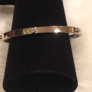 Silver tone bangle w crystals